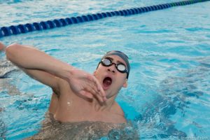 swimmer breathing while swimming