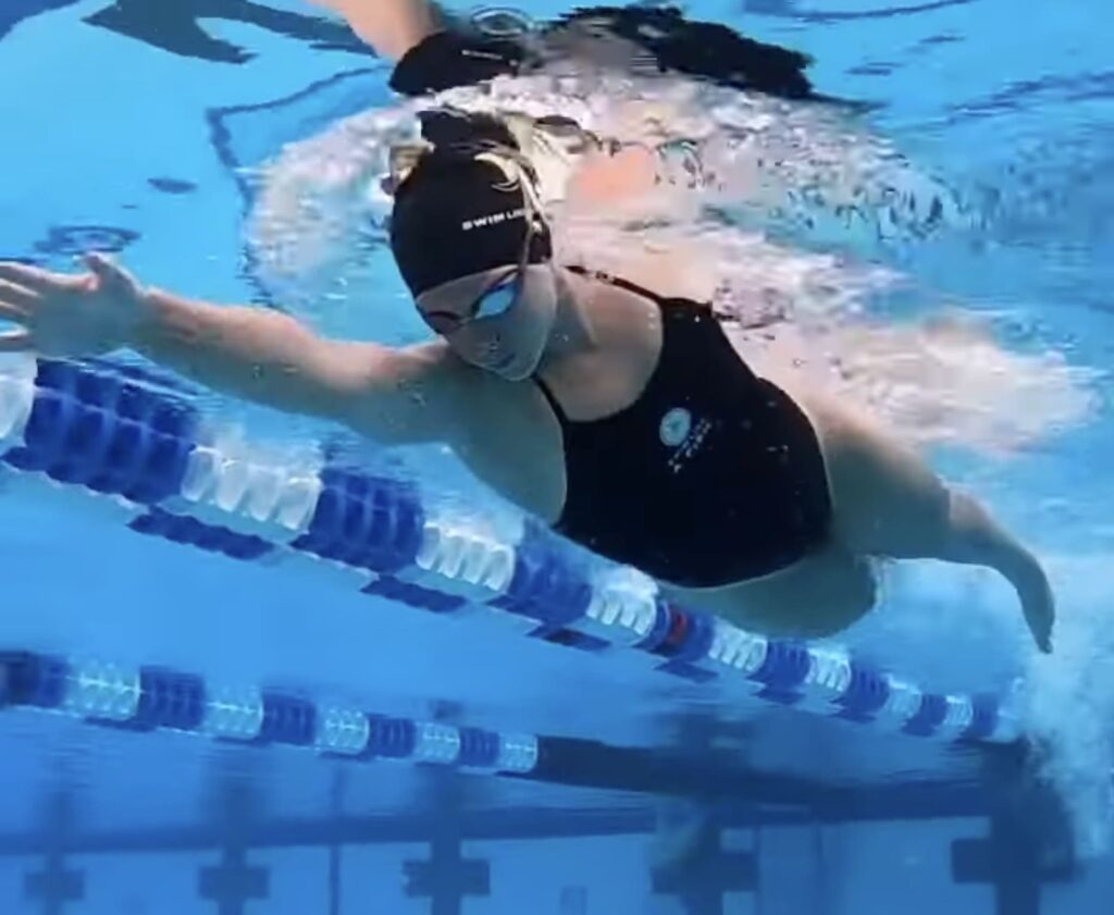 Coach Abbie Fish shows how to prevent legs from sinking while swimming
