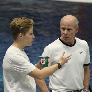 Abbie from Swim Like A. Fish talking to another swim coach.