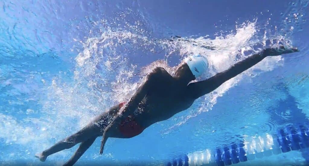 Underwater view of swimmer performing Backstroke