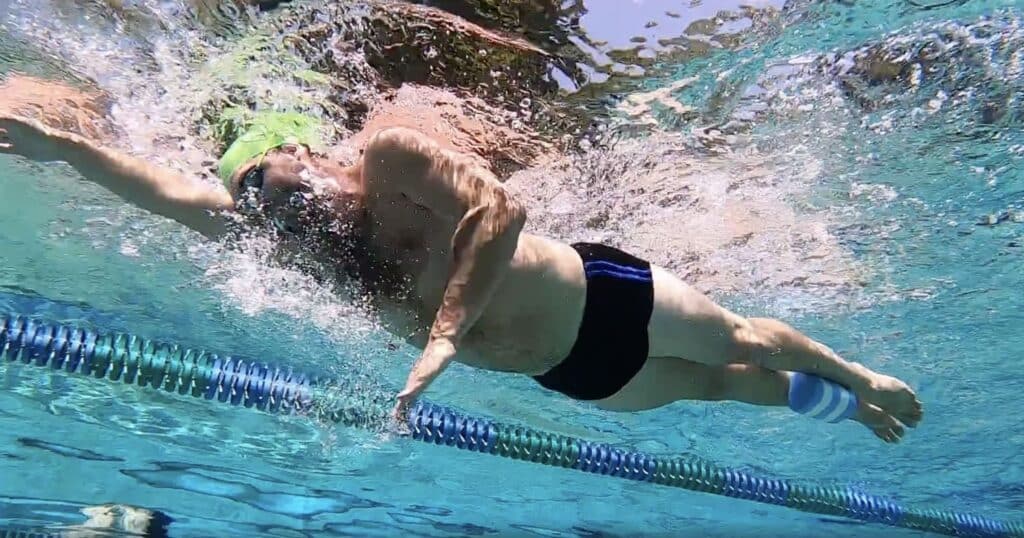 swimming drill with pull buoy