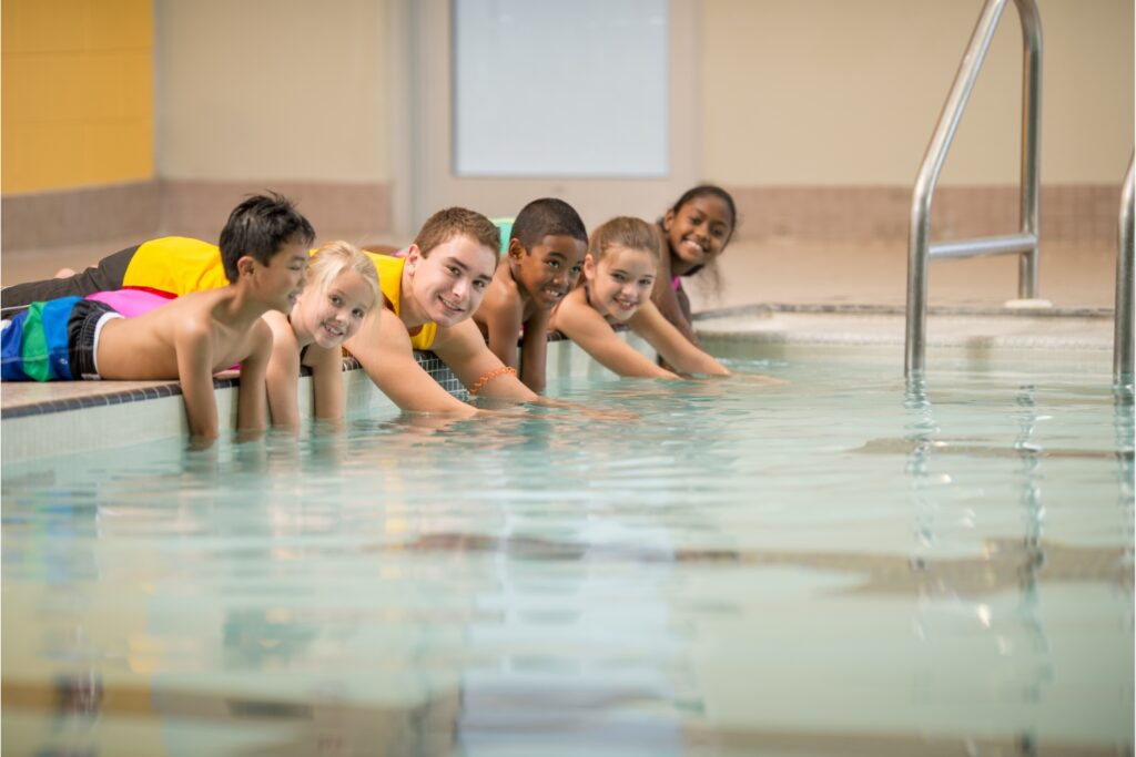 6-8 age groups swimmers doing dryland before swimming lessons