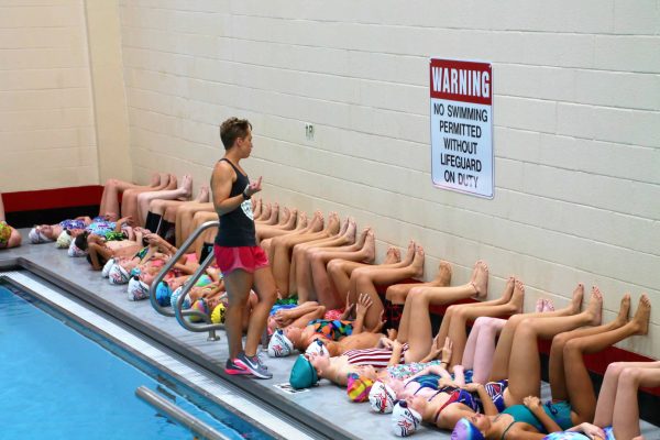 Abbie Fish during a swim camp training with young swimmers.